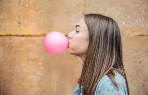 woman with braces on her teeth undergoing orthodontic treatment