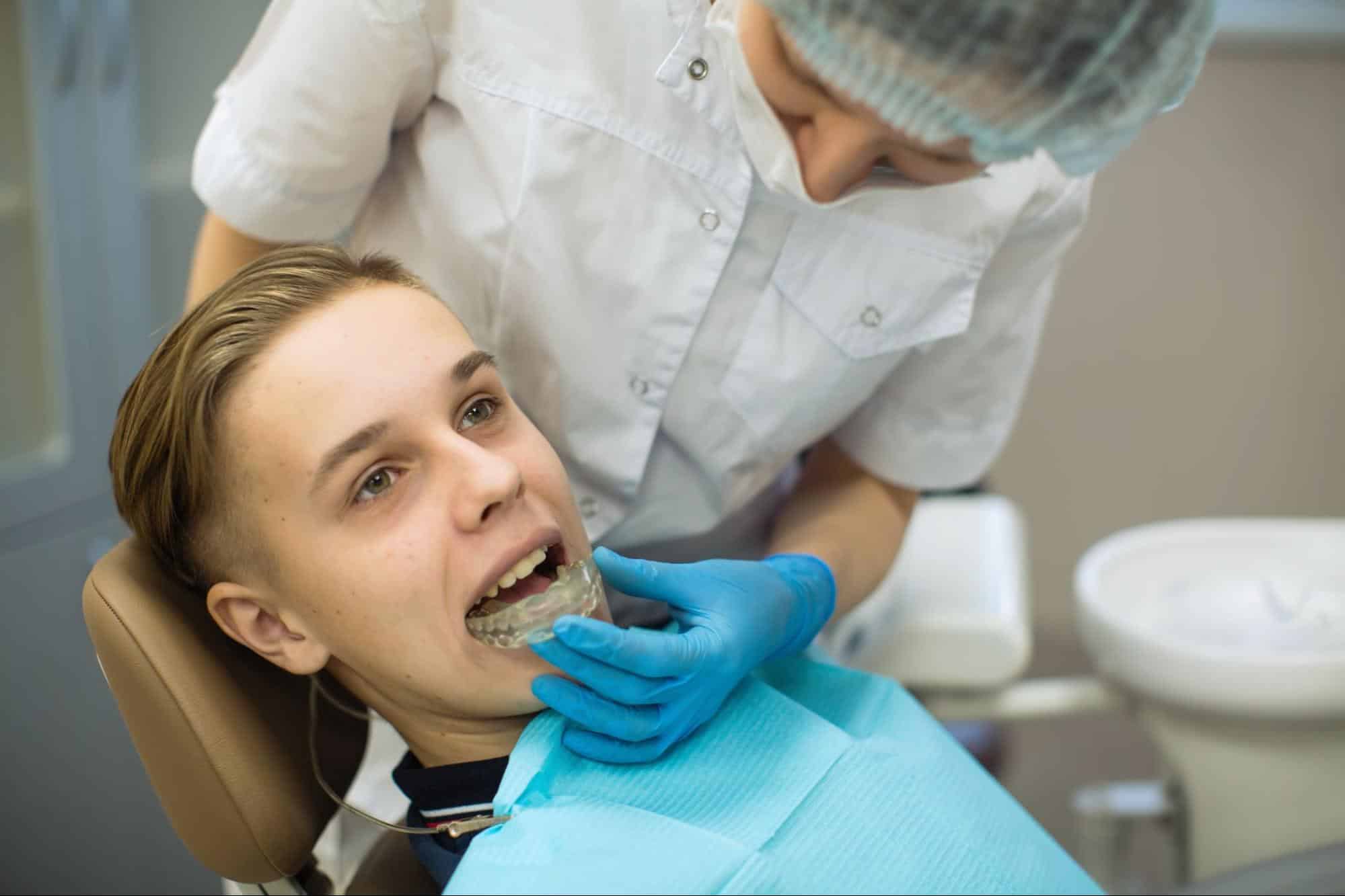 Orthodontist consulting with patient about clear aligners in Rocklin CA